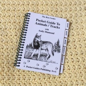Pocket guide book about animal tracks.